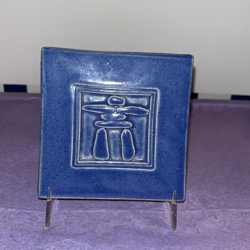 Tile.. ceramic.. with Inukskuk image on front